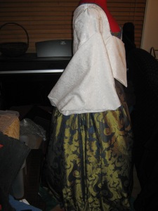 With the sleeves pinned up , side view showing the way they are supposed to drape.
